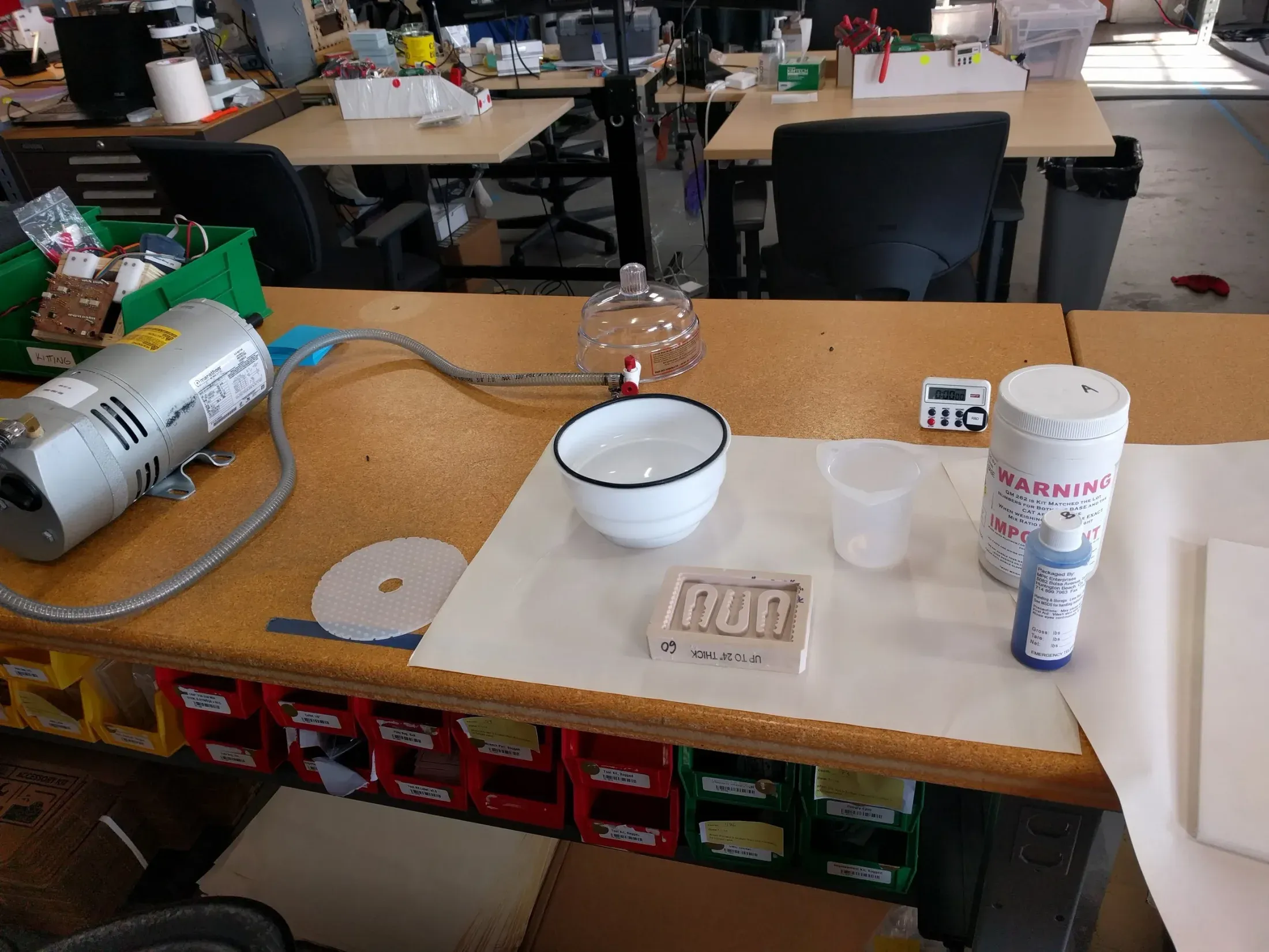 Resin and silicone casting setup with vacuum chamber and tools