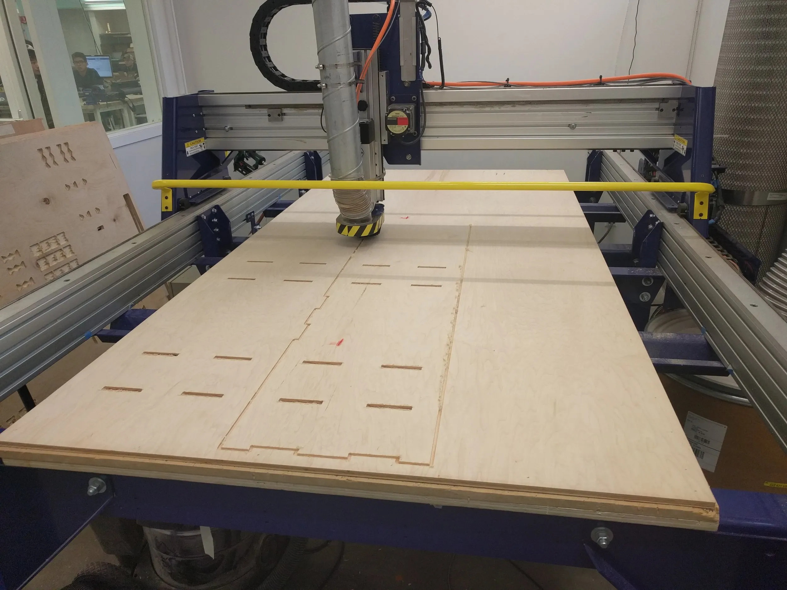 Milling the parts on a 4x8 Shopbot at Cal.