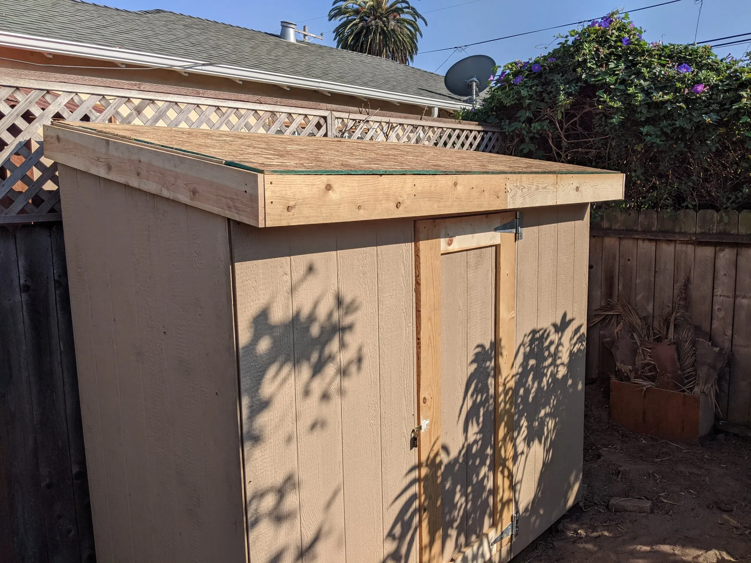 I had some leftover 1 x 4s from another project that worked well as trim around the roof.