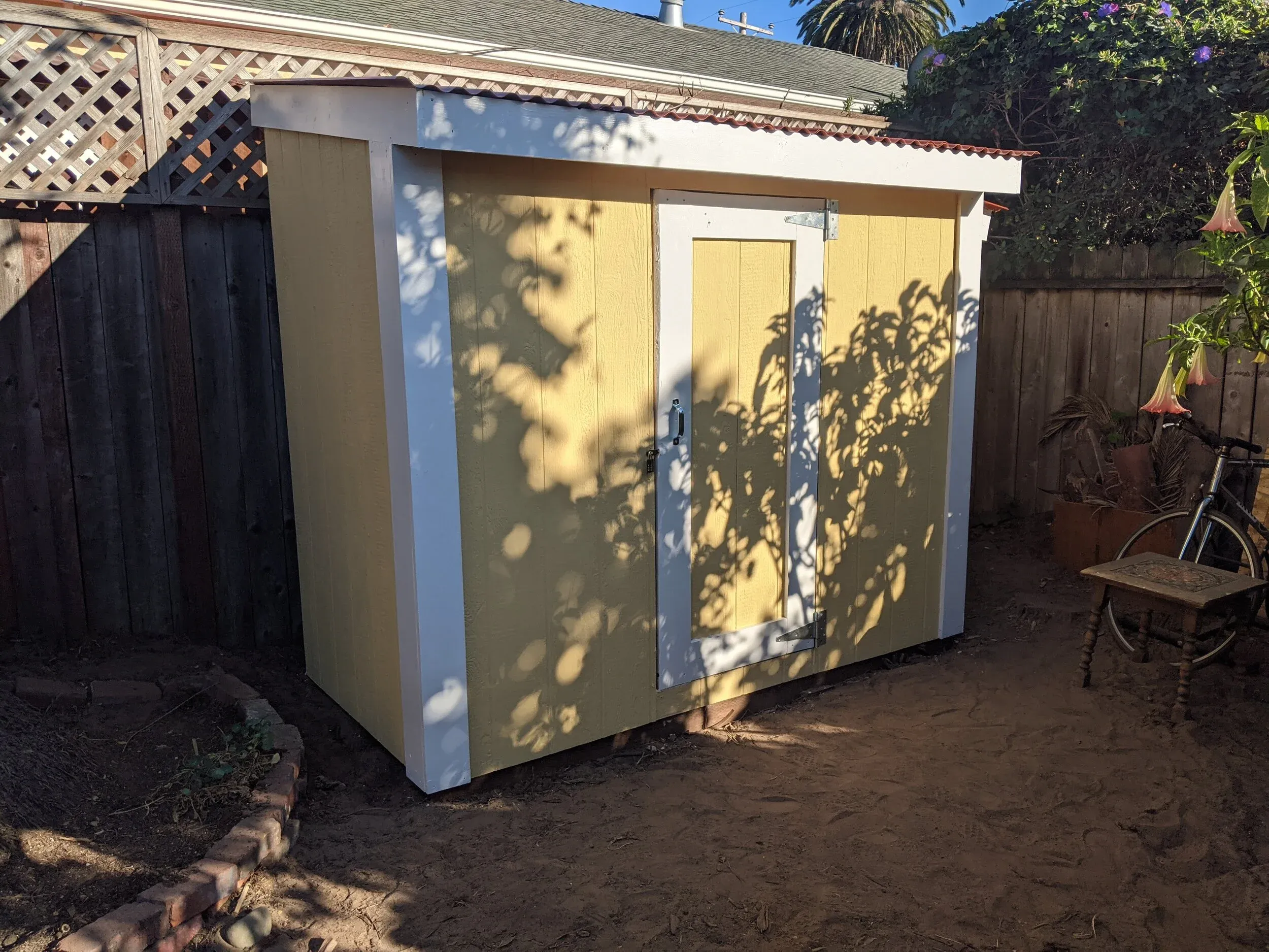 All done! The color was waaay more yellow than we anticipated.. I’d highly recommend testing with paint samples outdoors before selecting a color.